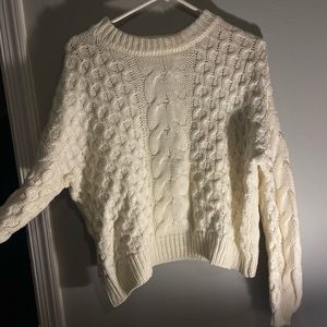 cream sweater
